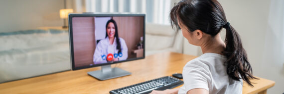 Patient receiving virtual physical therapy via video consultation, highlighting the convenience of remote care options.