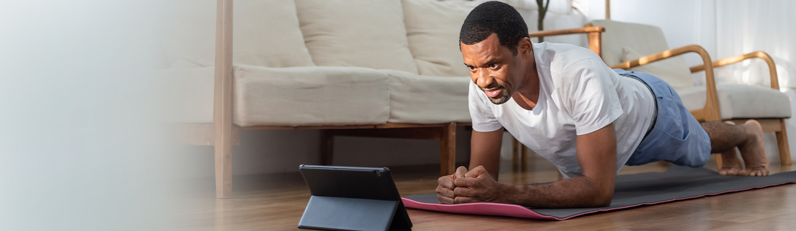 Healthcare provider using a digital device to enhance patient engagement during a consultation.