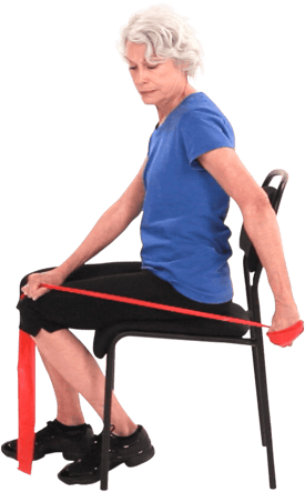 A person in a blue shirt uses a red resistance band, stretching it behind their back while seated.